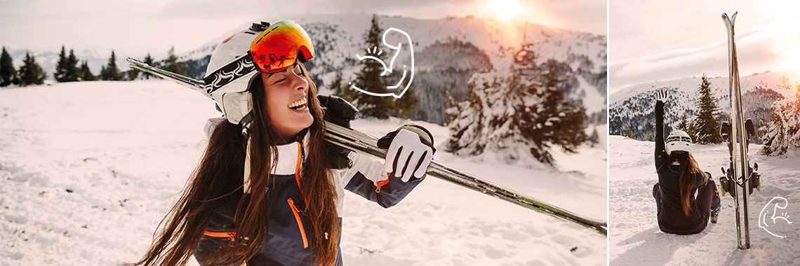 Frau mit Skiern im Schnee